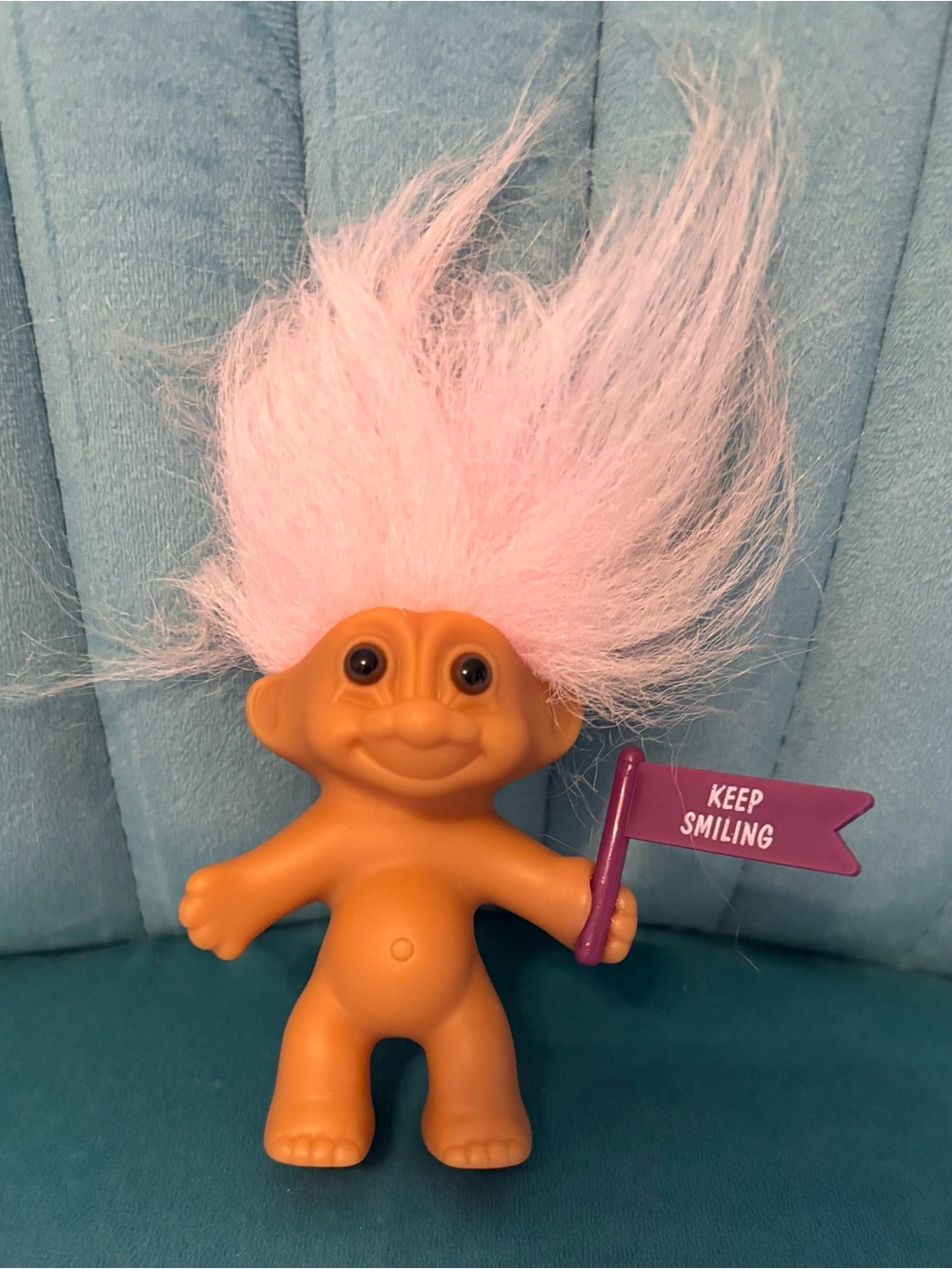 Vintage Style Orange Troll Doll with Pink Hair Holding 'Keep Smiling' Flag